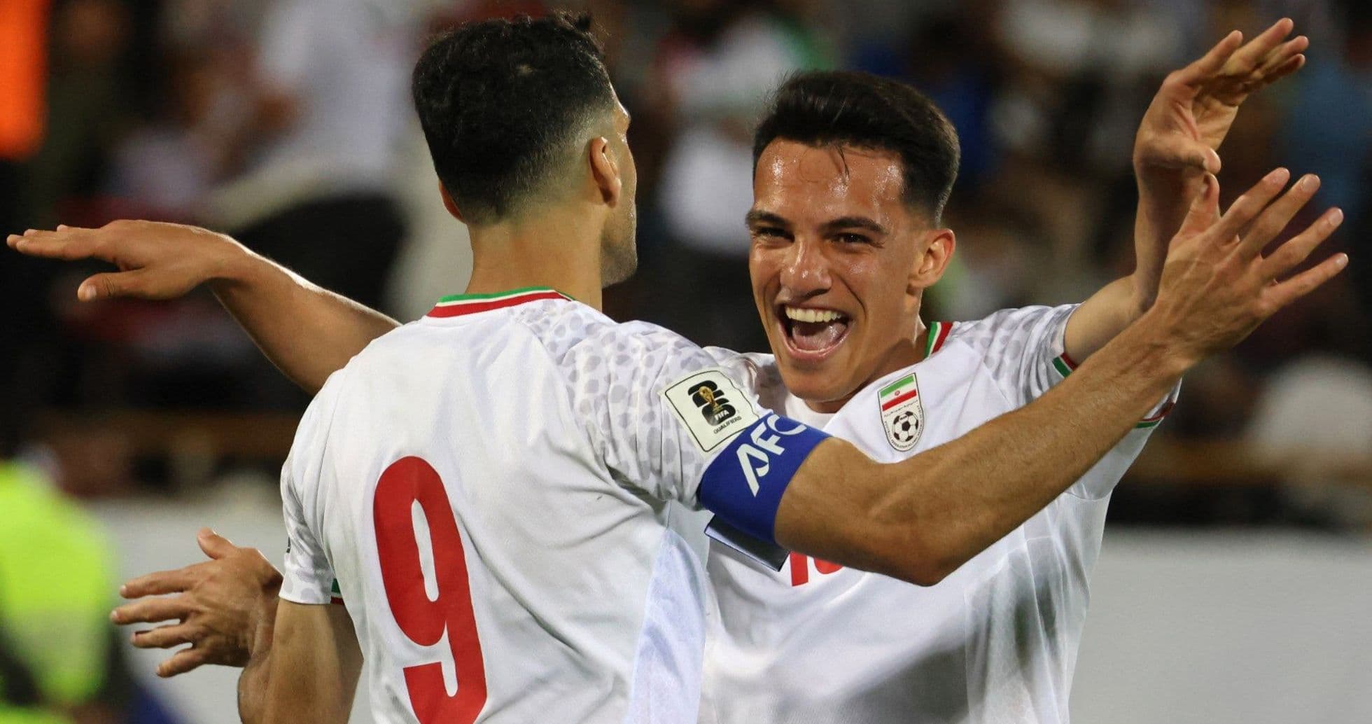 Jugadores iraníes celebrando un gol en el partido