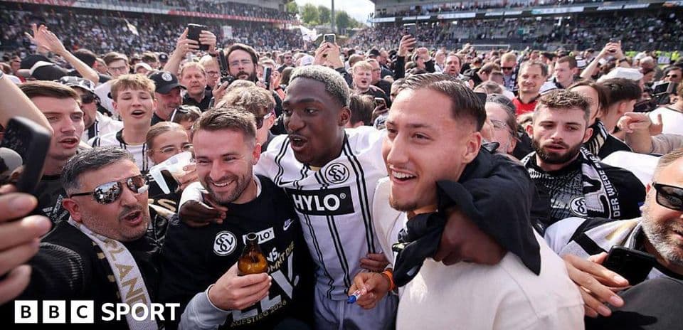 Agroup celebrating together after a football match