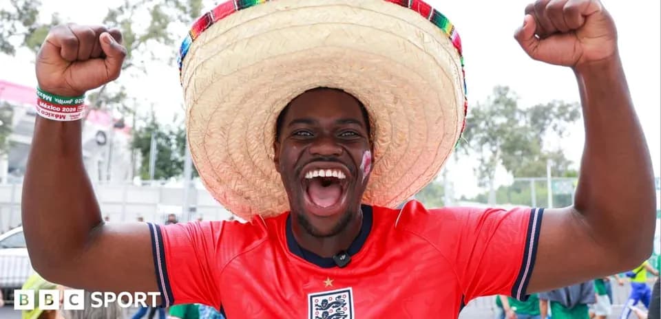 A fan celebrating with a sombrero at event