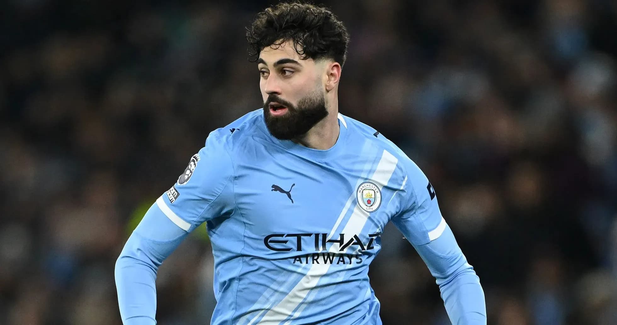 Jugador de Manchester City en acción durante partido