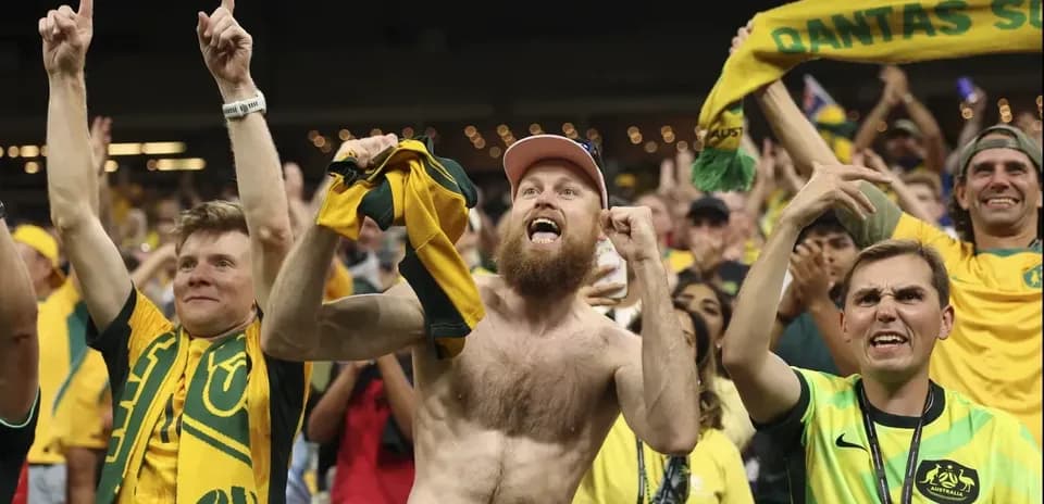 Aficionados de Australia animando en el estadio