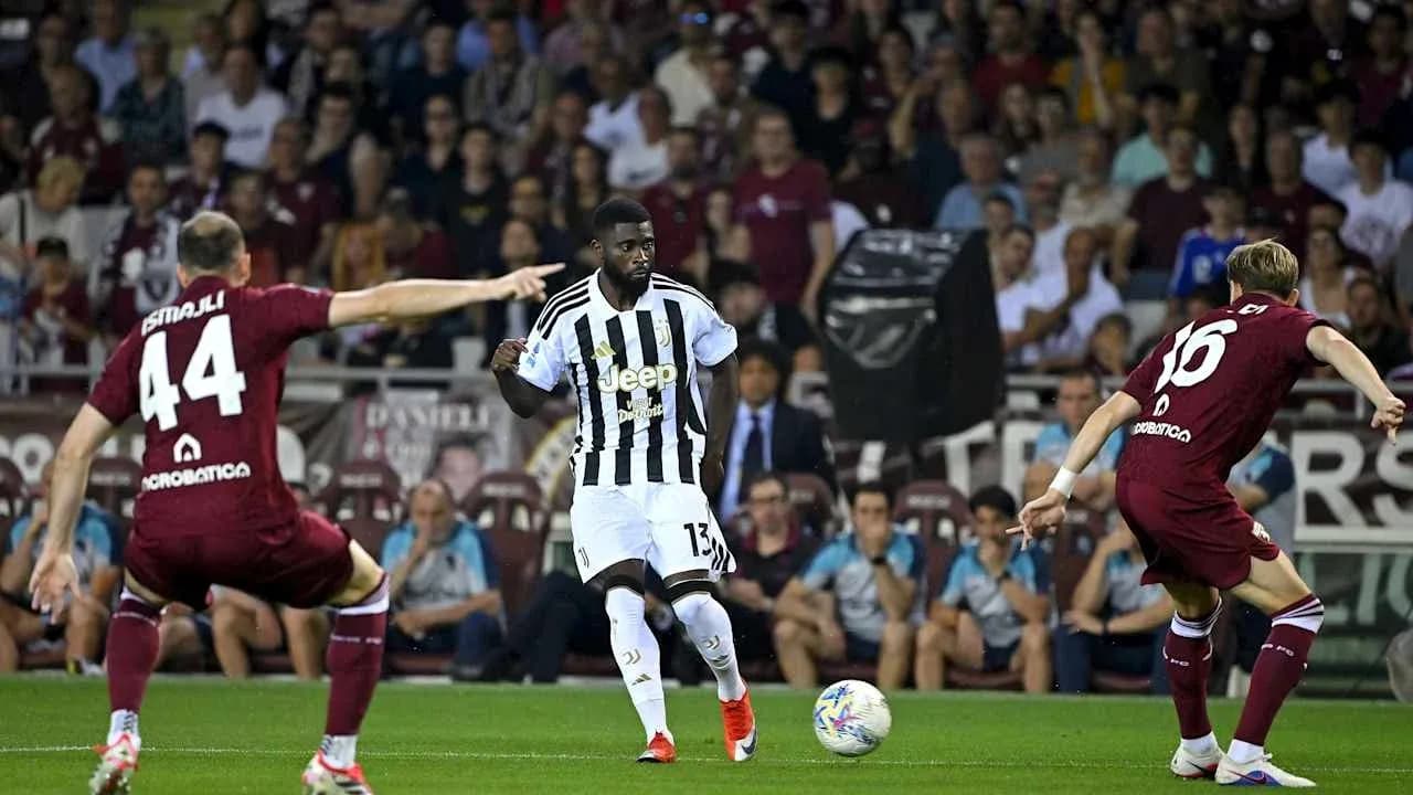 Jugadores de Torino y Juventus en acción