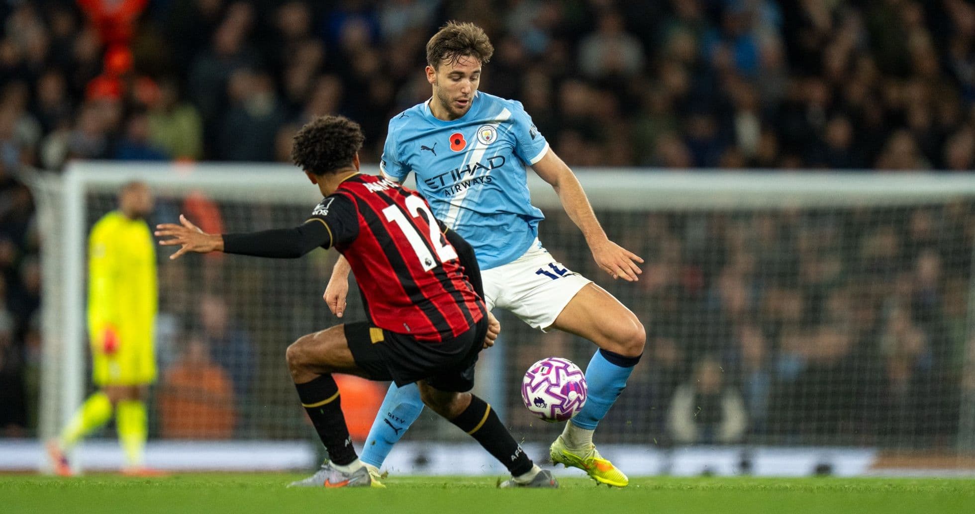 Jugadores de Bournemouth y Manchester City en acción