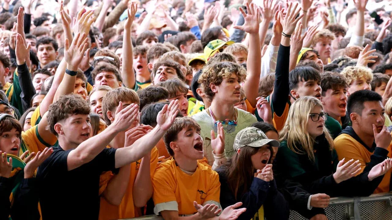Aficionados animando en un evento deportivo