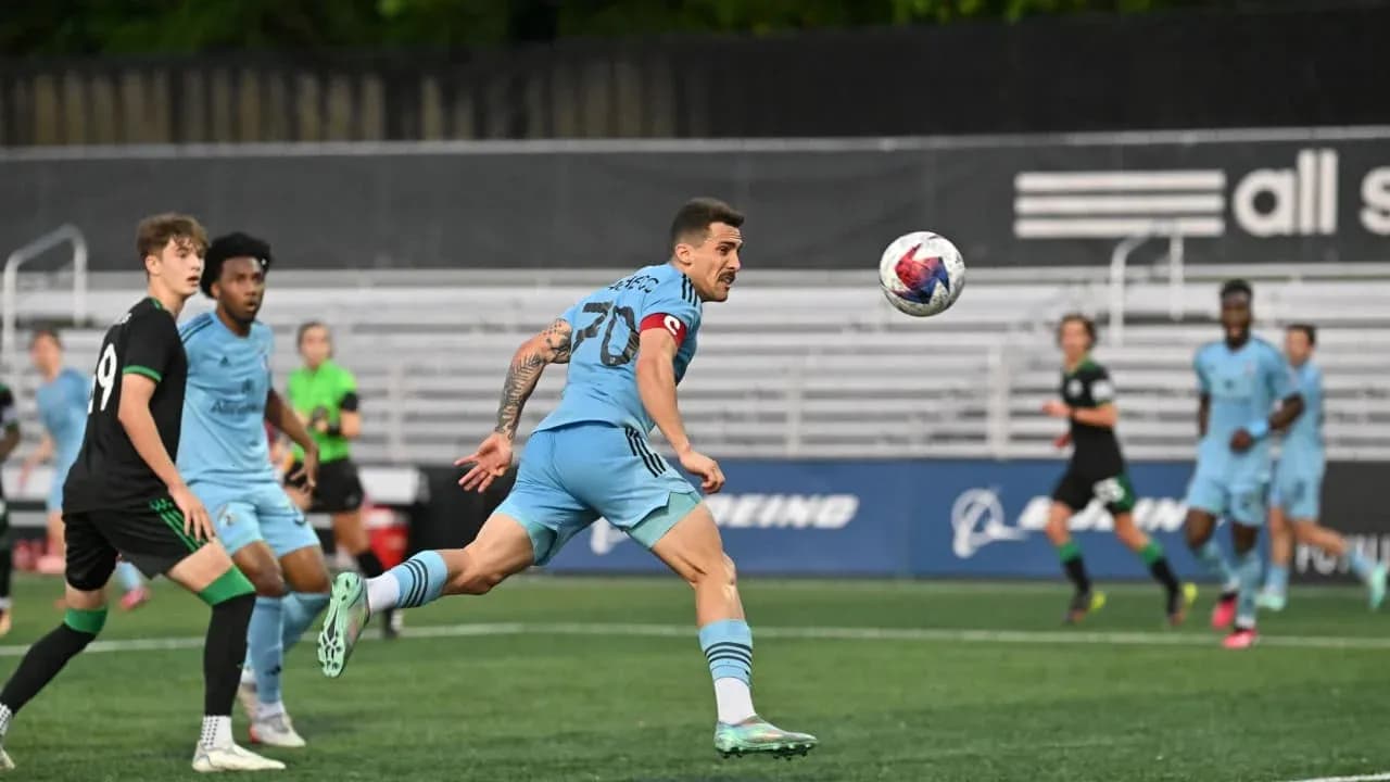 Jugador de Minnesota United II en acción Jugador de Minnesota United II en acción