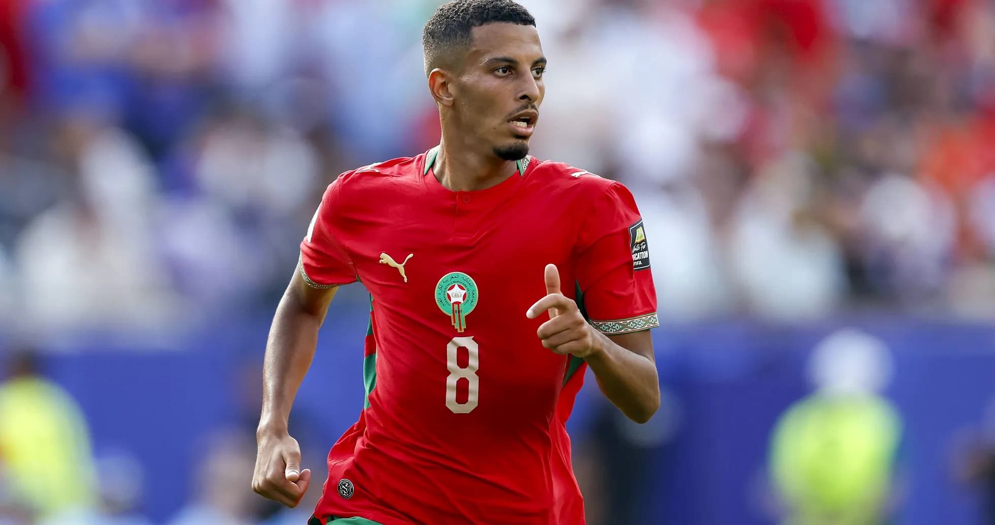 Jugador de Marruecos corriendo durante un partido Jugador de Marruecos corriendo durante un partido