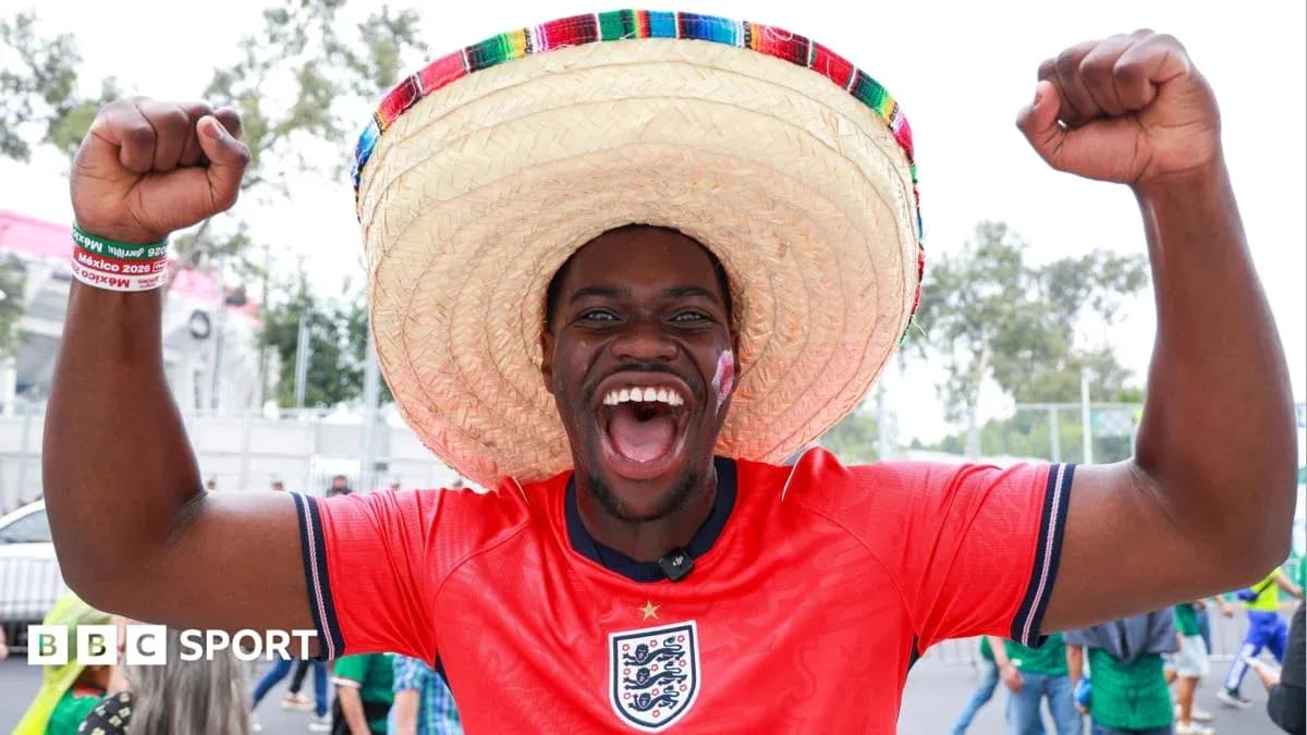 A fan celebrating with a sombrero at event A fan celebrating with a sombrero at event