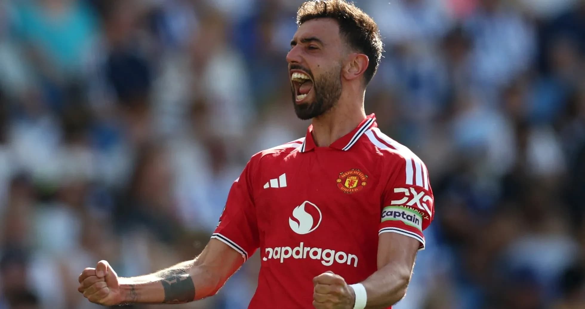 Jugador de Manchester United celebrando un gol Jugador de Manchester United celebrando un gol