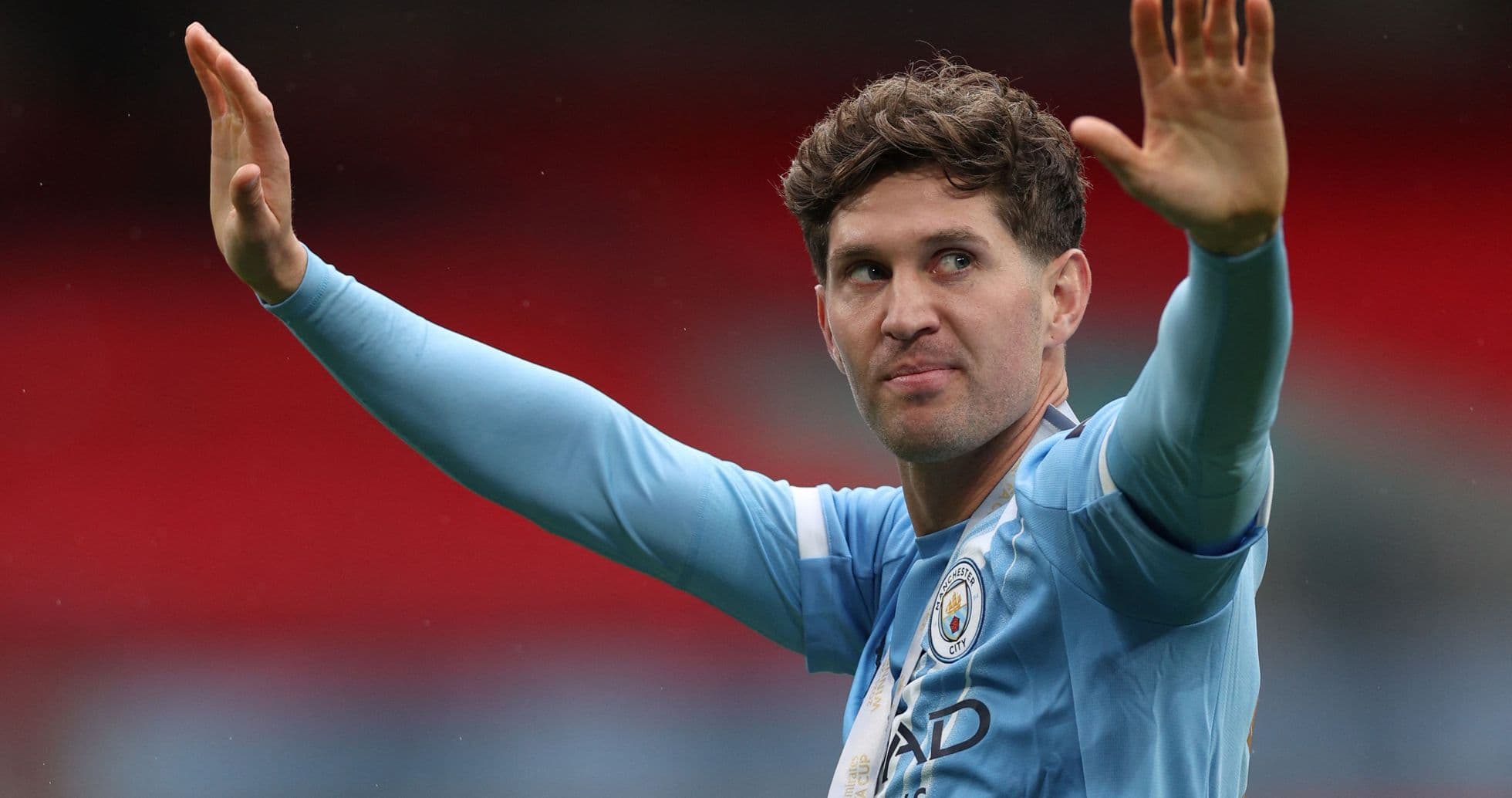 Jugador de Manchester City saludando al público Jugador de Manchester City saludando al público